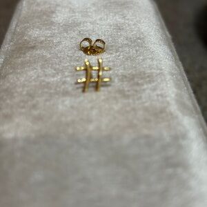 Tiffany & Co.  HASHTAG single gold earring .